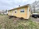 Exterior side view of the home at 3536 N Hawthorne Ln, Indianapolis, IN 46218