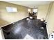 Empty living room features black hardwood flooring, neutral paint and multiple windows at 3536 N Hawthorne Ln, Indianapolis, IN 46218