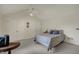 A neutral bedroom featuring vaulted ceilings and closet doors at 36 Palomino Ct, Zionsville, IN 46077