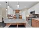 Bright kitchen featuring stainless steel appliances, granite countertops, and center island with breakfast bar at 3748 Pawnee Trl, Columbus, IN 47203