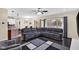 Spacious living area with large sectional sofa, hardwood floors, and open layout at 3748 Pawnee Trl, Columbus, IN 47203