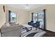 Comfortable sitting room with large windows, natural light, and stylish decor at 3748 Pawnee Trl, Columbus, IN 47203