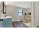 Beautiful bathroom featuring a modern vanity, updated fixtures and an open shower at 3771 Lakewood Dr, Greenfield, IN 46140