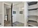 Bathroom features a glass enclosed shower with built-in niche and tile flooring at 3771 Lakewood Dr, Greenfield, IN 46140