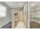 Stylish bathroom boasting an open shower with a built-in bench and modern accents at 3771 Lakewood Dr, Greenfield, IN 46140