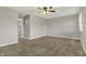 A spacious bedroom offers comfort and style with plush carpet and neutral tones at 3771 Lakewood Dr, Greenfield, IN 46140