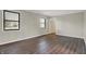 The bright bedroom features durable and attractive flooring and an abundance of natural light at 3771 Lakewood Dr, Greenfield, IN 46140