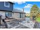 Inviting deck with outdoor seating, creating a cozy and relaxing outdoor living space with a view of the yard at 3771 Lakewood Dr, Greenfield, IN 46140