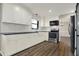 Newly remodeled kitchen boasts stainless steel appliances, elegant countertops, and modern fixtures at 3771 Lakewood Dr, Greenfield, IN 46140