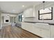 Spacious kitchen flowing into the living area boasts with an abundance of counter and cabinet space at 3771 Lakewood Dr, Greenfield, IN 46140