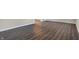 Attractive and durable plank flooring creates an elegant look in this inviting room at 3771 Lakewood Dr, Greenfield, IN 46140
