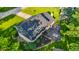 Aerial view of the home's deck and yard with mature landscaping at 3771 Lakewood Dr, Greenfield, IN 46140