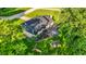 Aerial view of the home's deck and yard with mature landscaping at 3771 Lakewood Dr, Greenfield, IN 46140