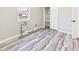 Serene bedroom with natural light, closet space, and modern flooring, providing a comfortable and stylish retreat at 3913 Eastern Dr, Anderson, IN 46012