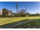 Backyard featuring a lush green lawn and black iron fence in a peaceful, residential neighborhood at 4068 Bozeman Way, Bargersville, IN 46106