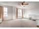 Light-filled carpeted bedroom with large windows and a baby crib, perfect for a Bedroom at 4068 Bozeman Way, Bargersville, IN 46106