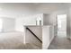 Bright upstairs hallway with neutral carpet and white walls at 4068 Bozeman Way, Bargersville, IN 46106