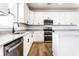 This kitchen has stainless appliances, marble countertops and white cabinets at 4068 Bozeman Way, Bargersville, IN 46106