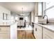 This kitchen features an island, and stainless appliances that opens to a dining area at 4068 Bozeman Way, Bargersville, IN 46106