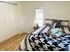 Bright bedroom featuring a comfortable bed with stylish black-and-white patterned bedding at 414 Glendale Dr, Columbus, IN 47201