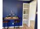 Cozy dining area includes a small dining table with seating and built in shelving at 414 Glendale Dr, Columbus, IN 47201