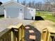 Exterior of a detached garage with a well-maintained yard and stepping stones at 414 Glendale Dr, Columbus, IN 47201