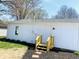 Exterior of detached garage showcasing clean design and yard view, perfect for storage at 414 Glendale Dr, Columbus, IN 47201