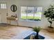Inviting living room showcasing stylish decor, natural light from a large window, and light wood floors at 414 Glendale Dr, Columbus, IN 47201