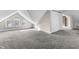 Finished attic space with diamond windows and plush neutral carpeting at 434 E New York St, Indianapolis, IN 46202
