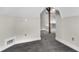 Finished attic space with hardwood post and trim and plush neutral carpeting at 434 E New York St, Indianapolis, IN 46202