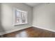 Bedroom with hardwood floors, a bay window, fresh paint, and nice natural light at 434 E New York St, Indianapolis, IN 46202