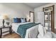 Comfortable bedroom with natural light, a cozy rug, and a luxurious bed set at 434 E New York St, Indianapolis, IN 46202