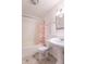Bathroom featuring tub-shower combination, white wainscoting and modern fixtures at 4743 Little Hurricane Rd, Martinsville, IN 46151