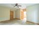 Cozy bedroom features neutral walls, ceiling fan, and great natural light at 4743 Little Hurricane Rd, Martinsville, IN 46151