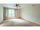 Inviting bedroom with natural light and neutral carpet, perfect for relaxation at 4743 Little Hurricane Rd, Martinsville, IN 46151