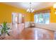 Formal dining room with hardwood floors, large window, and elegant chandelier at 4743 Little Hurricane Rd, Martinsville, IN 46151