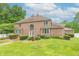 Lovely two-story brick home with a manicured backyard and brick patio at 4743 Little Hurricane Rd, Martinsville, IN 46151