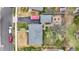 Aerial view of the home's layout, driveway, and backyard entertainment space at 5440 Maplewood Dr, Indianapolis, IN 46224