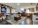 Finished basement area with a sofa, a table, and decorations at 5440 Maplewood Dr, Indianapolis, IN 46224
