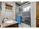 Stylish bathroom with shower, granite vanity, and decorative accents at 5440 Maplewood Dr, Indianapolis, IN 46224