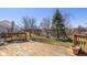 Spacious wooden deck overlooking the well maintained backyard and scenic pond view at 546 Treyburn Lakes Way, Indianapolis, IN 46239