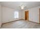 Bright bedroom features carpet, neutral walls, a ceiling fan, and a sun-filled window at 546 Treyburn Lakes Way, Indianapolis, IN 46239