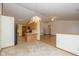 Open kitchen layout with laminate flooring, modern appliances, and bright lighting at 546 Treyburn Lakes Way, Indianapolis, IN 46239