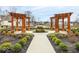 Community space features pergola, landscaping, and walking path at 583 Exmoor Dr, Carmel, IN 46032