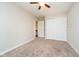 Bedroom featuring neutral carpet, a ceiling fan, and a closet with sliding doors at 5875 Mill Haven Way, Noblesville, IN 46062