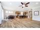 Open-concept space with dining area connected to a modern kitchen island at 5875 Mill Haven Way, Noblesville, IN 46062