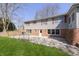 A multi-level home features a brick patio and spacious backyard, perfect for outdoor activities and entertaining at 5913 W Maple Dr, Frankton, IN 46044