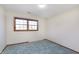 Bedroom with neutral walls and floors featuring a window at 5913 W Maple Dr, Frankton, IN 46044