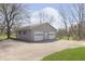 Large detached garage with three bays offers ample parking and storage space at 5913 W Maple Dr, Frankton, IN 46044