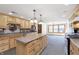 Well-appointed kitchen featuring a central island, stainless appliances and a large dining area at 5913 W Maple Dr, Frankton, IN 46044